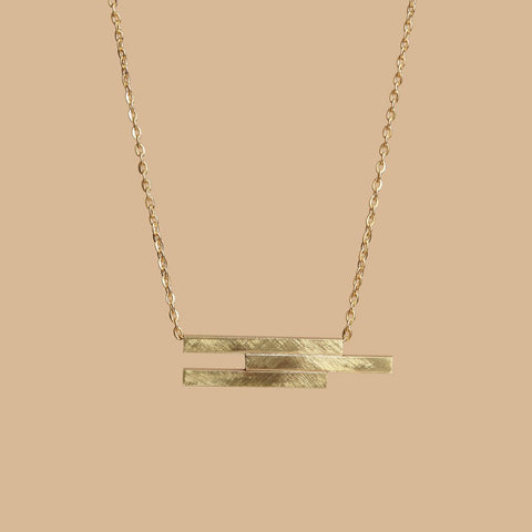 Geo offset gold necklace