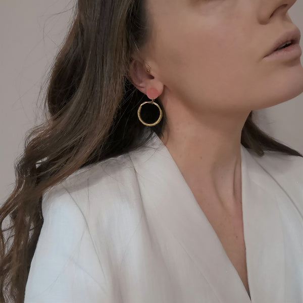 Wrapped 18 carat gold vermeil and pink acrylic hoop earrings model