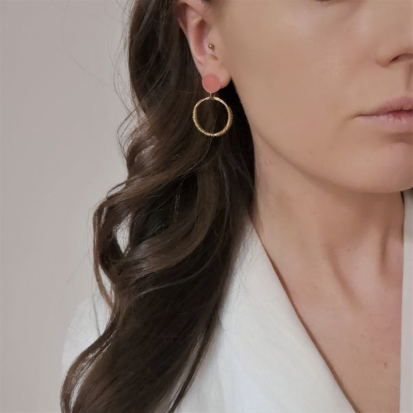 Wrapped 18 carat gold vermeil and pink acrylic hoop earrings model