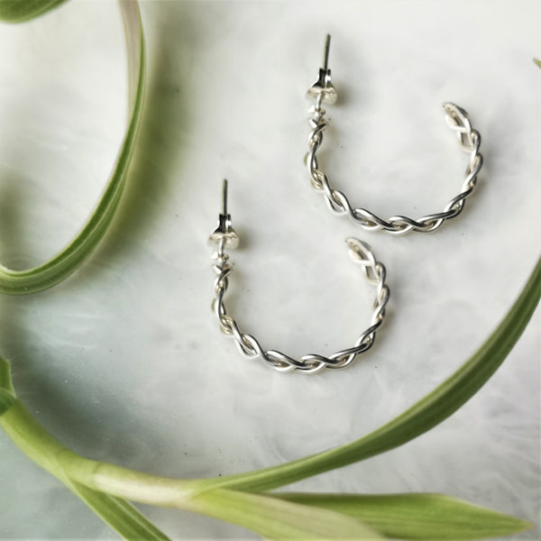 Solid silver plait hoop earrings