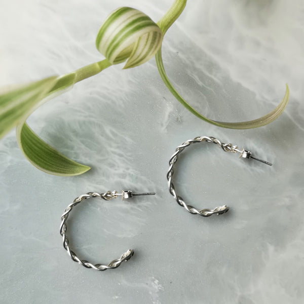Solid silver plait hoop earrings