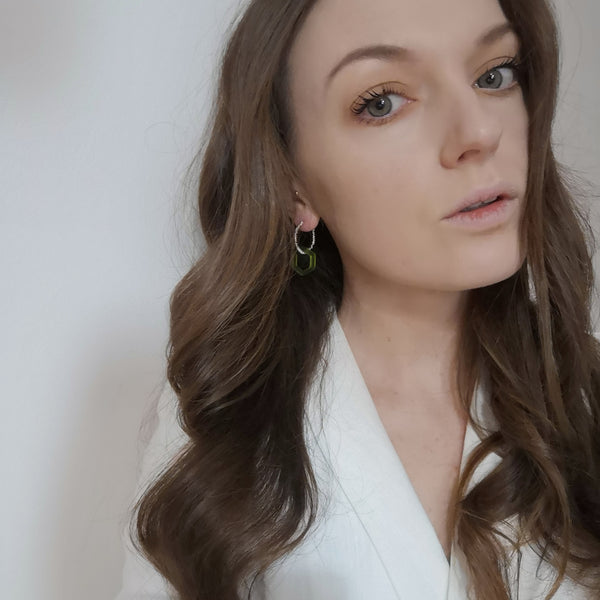 Solid silver wrap and green hex acrylic hoop earrings model