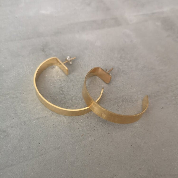 Flat hoop gold earrings