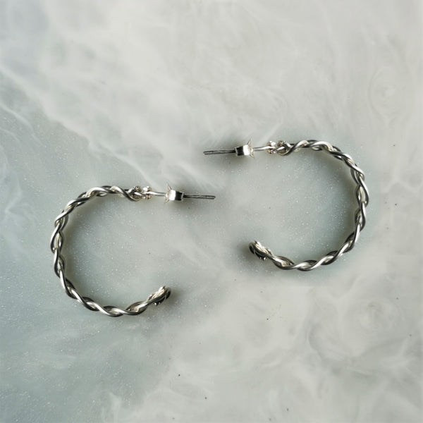 Solid silver plait hoop earrings
